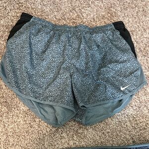 Nike Women's Teal Patterned Athletic Shorts with Black Accents